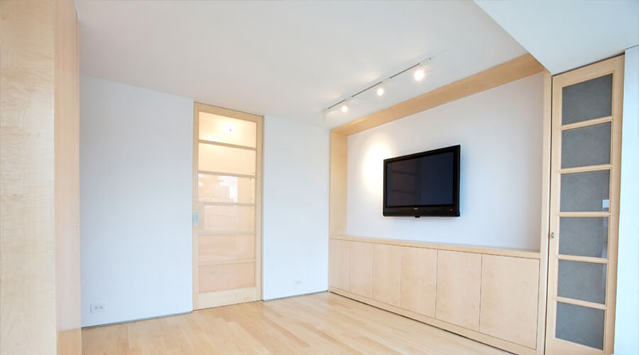 Custom entertainment center by NYC Millwork