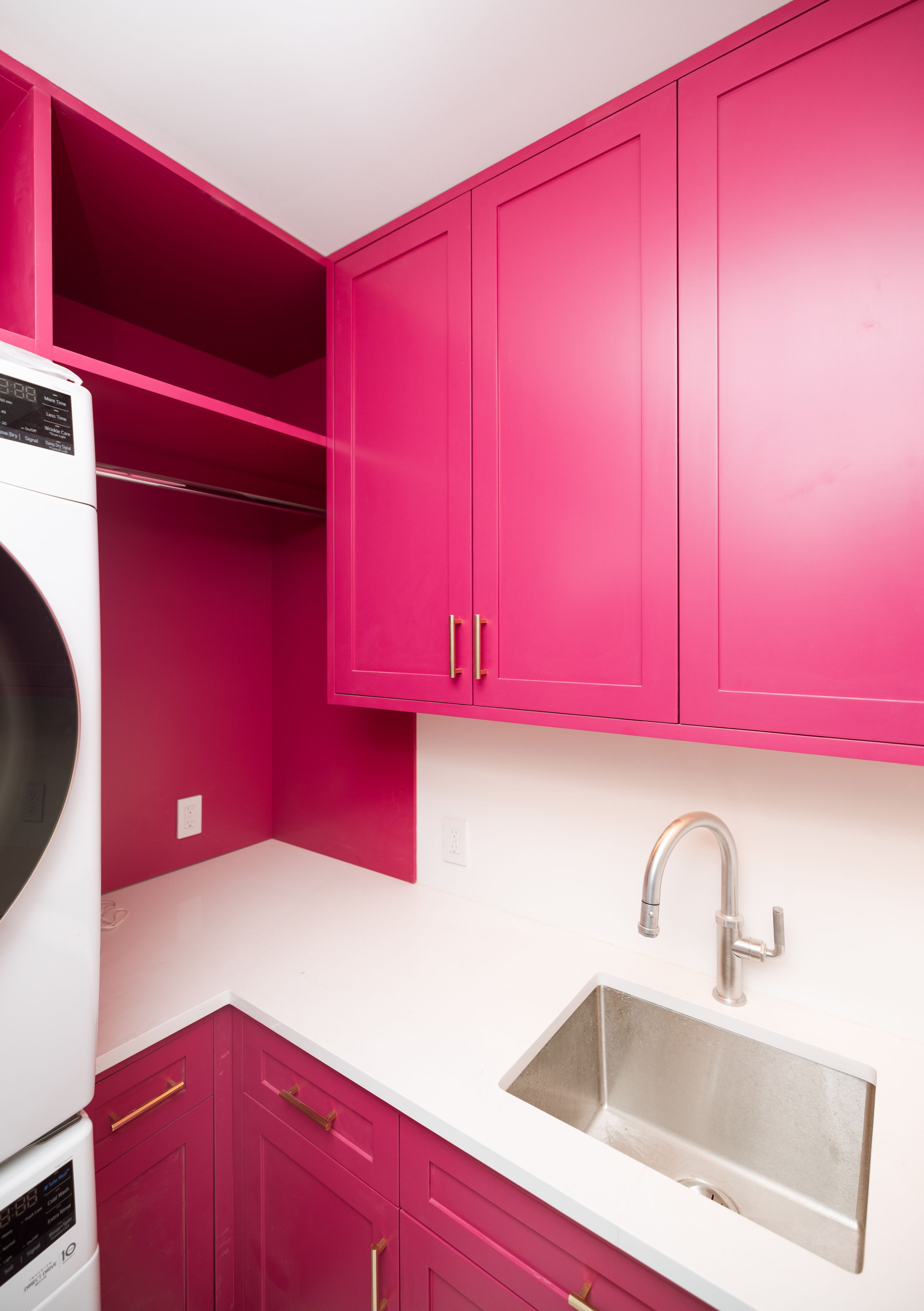 Pink Lacquer Laundry Room by NYC Millwork